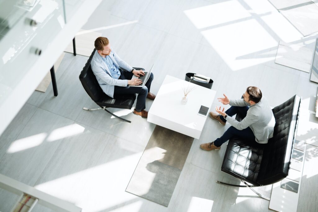 Investor questions on a business meeting in lobby